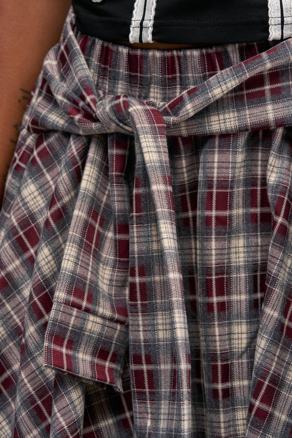 FEELING ALL OVER THE PLACE PLAID MIDI SKIRT