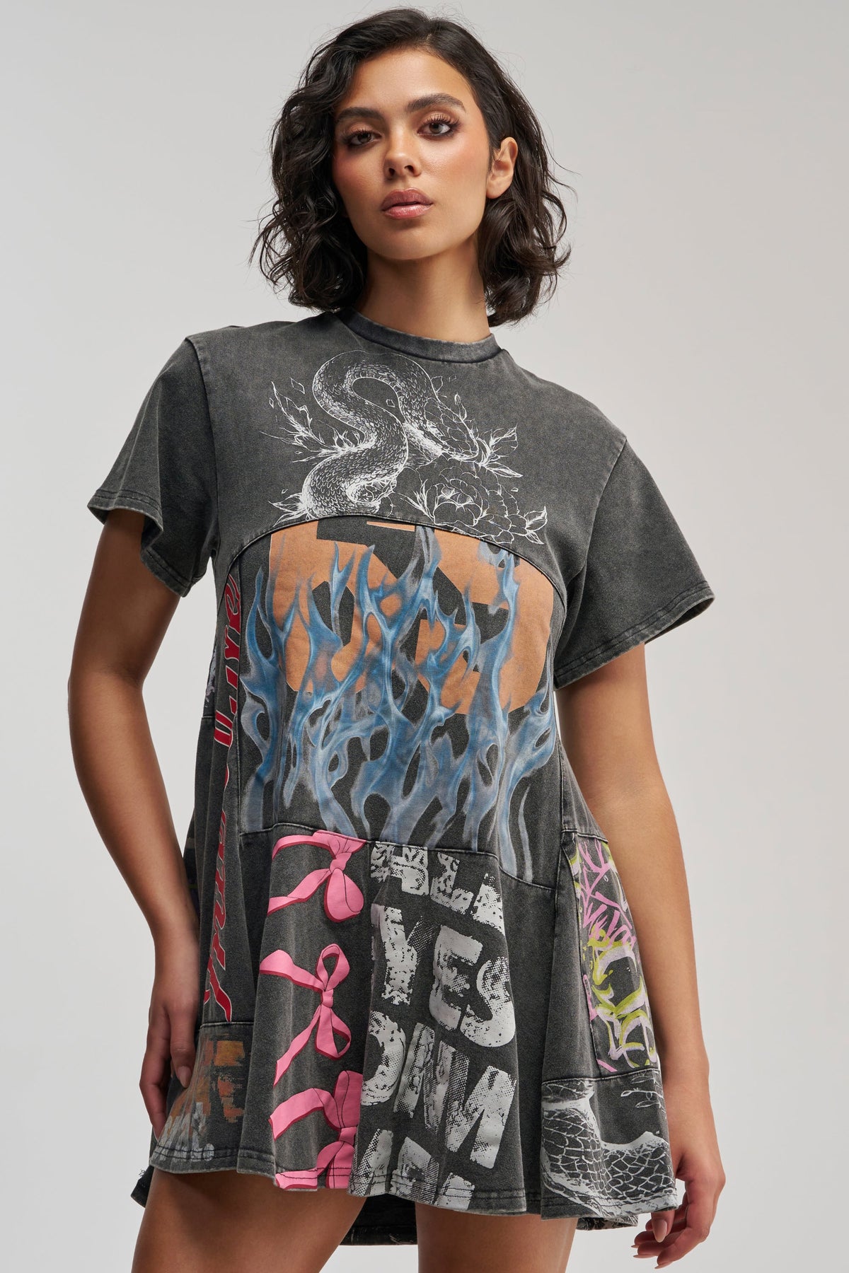 COLD HEARTED GRAPHIC MINI DRESS IN BLACK MULTI