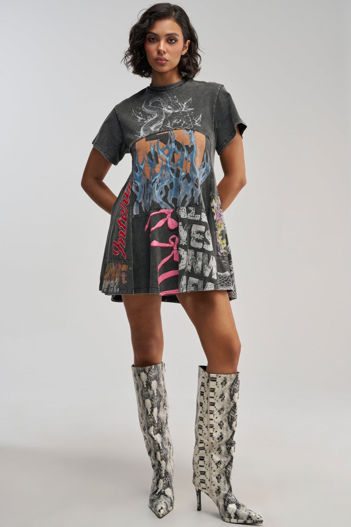 COLD HEARTED GRAPHIC MINI DRESS IN BLACK MULTI