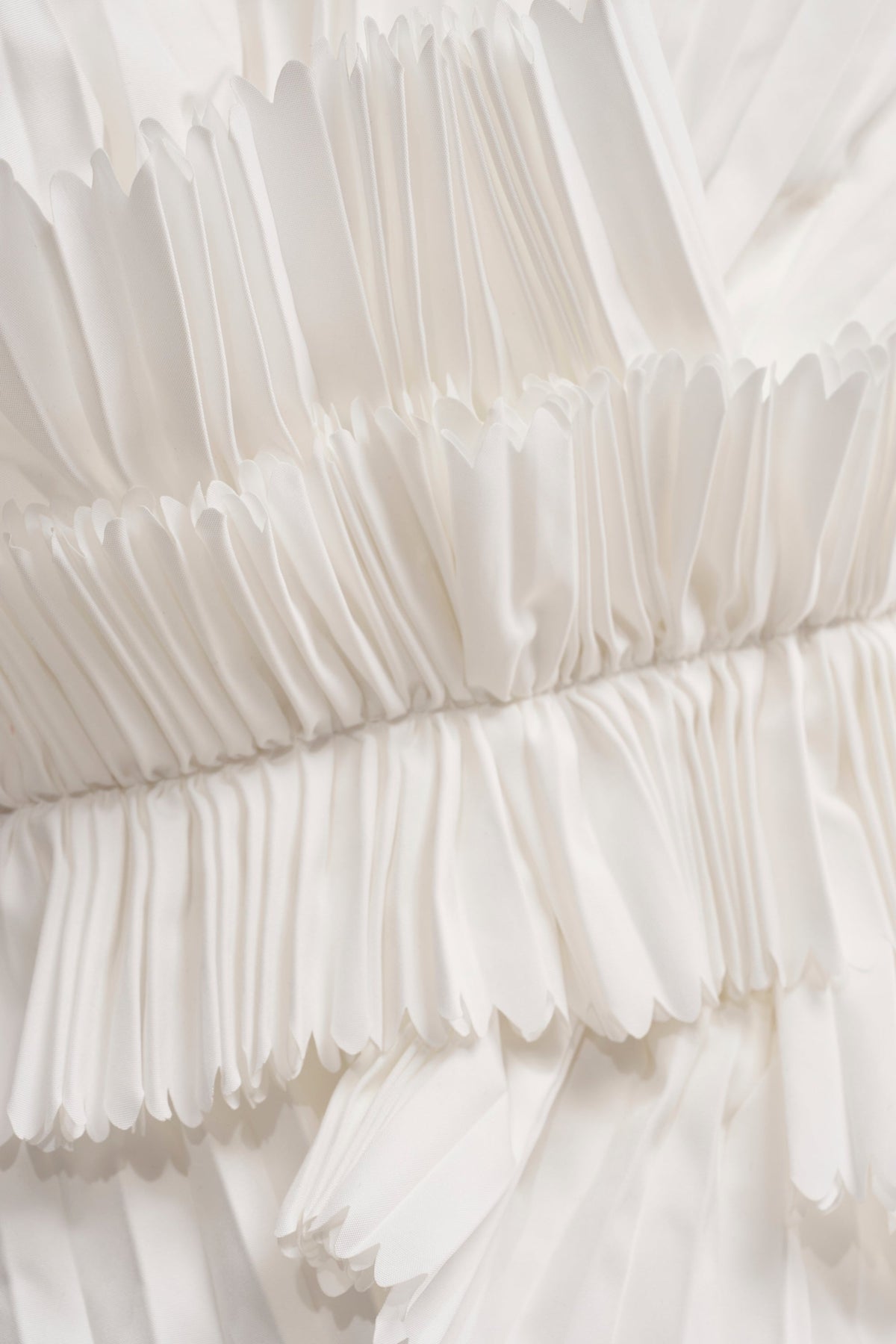 LUXURIOUS ASYMMETRICAL TOP IN WHITE